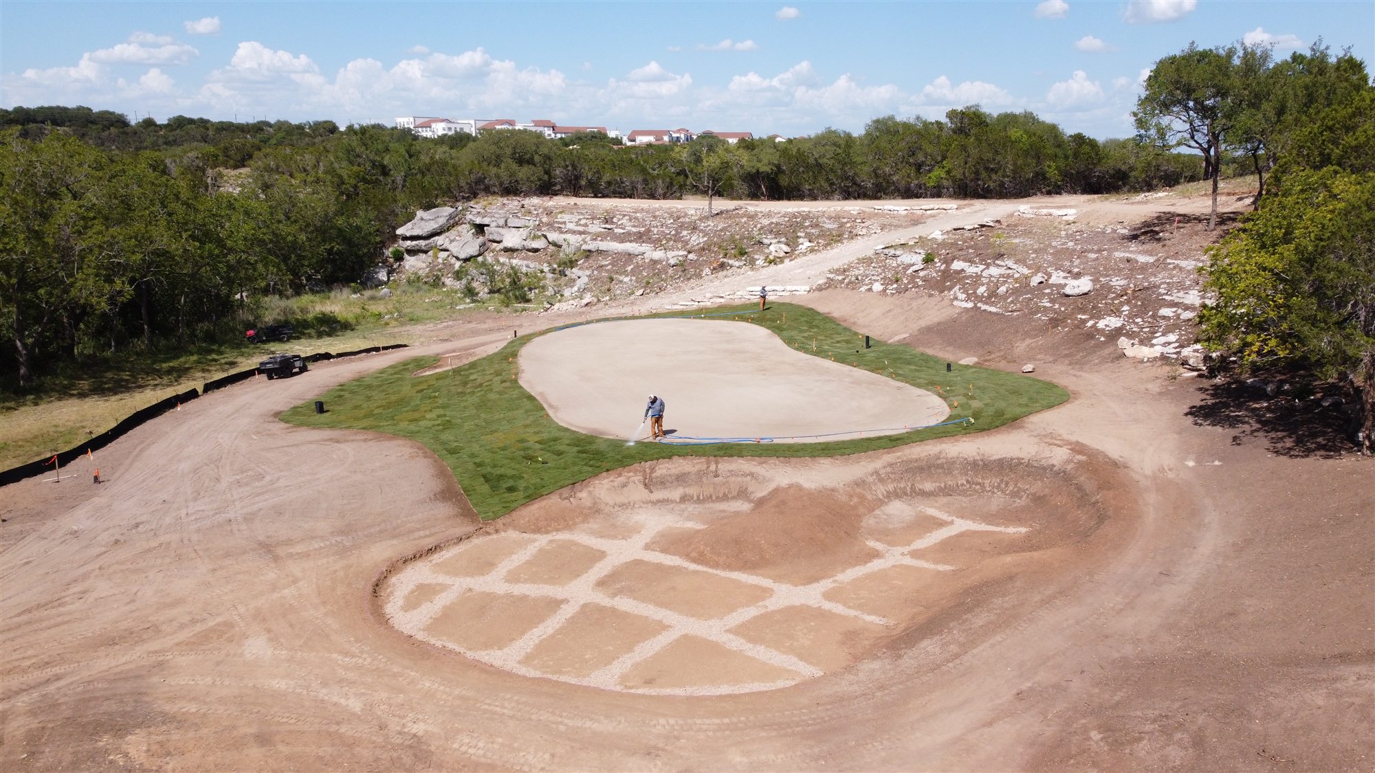 Crew working on golf course construction at Spanish Oaks Golf Club